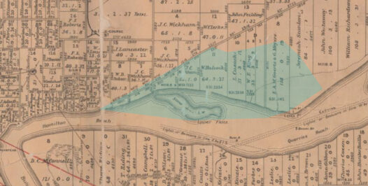A vintage map from 1887 showing land parcels along the Brisbane River. Includes property boundaries, owner names, and topographical features. The current-day Northshore area is highlighted in blue, covering part of the river and surrounding land.